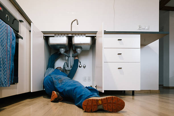 Professional Plumbing technician working in Garden City, NY